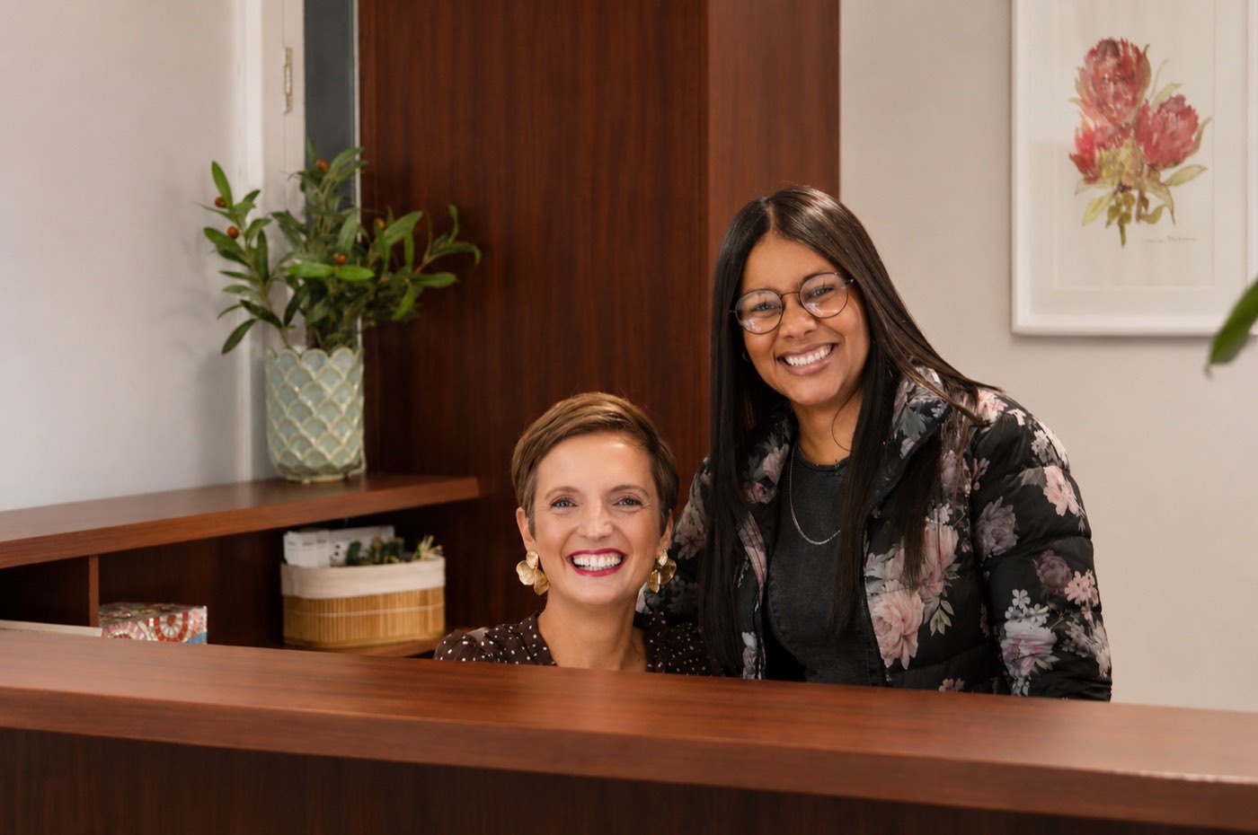 Anneke de Wit and Kirsty Thompson at the practice reception desk